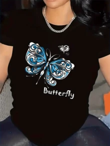 Mariposa azul con alas llenas de movimiento que simbolizan libertad renovación y belleza envolviendo el espíritu femenino camiseta de mujer casual cómoda para uso diario - Negro - Ver 1