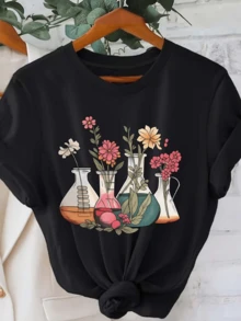 Glass Jars With Colorful Flowers Symbolizing The Union Between Science And Nature, Creating An Atmosphere Of Harmony And Serenity. Women's Casual, Modern, Comfortable T-Shirt For Everyday Wear. - Black - View 6