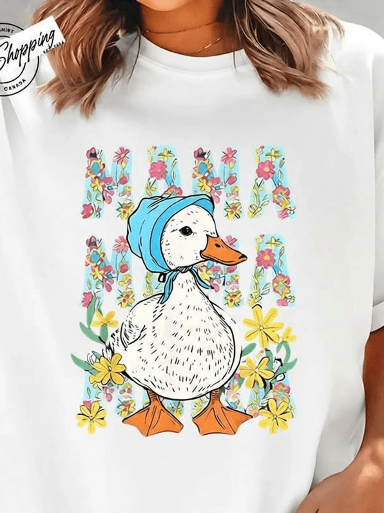 A Duck With A Blue Bandana Surrounded By Colorful Flowers Symbolizes Tenderness And Springtime Joy. With Decorative Lettering And Vibrant Colors, This Women's T-Shirt Is Casual, Modern, Comfortable, And Charming. - 白色 - 查看 1