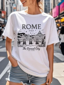 Puente histórico sobre el río acompañado de aves en vuelo y edificios clásicos que evocan la antigua Roma símbolo de belleza eterna y cultura monumental camiseta de mujer cómoda y moderna - Blanco - Ver 6