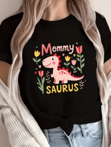 A Smiling Pink Dinosaur Surrounded By Colorful Flowers And Hearts Conveys Tenderness And Maternal Love, Ideal For Cheerful Mothers. A Comfortable, Modern, Casual Women's T-Shirt. - 黑色 - 查看 6