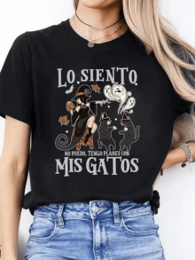 A Fun Scene With A Woman Dressed As A Witch Accompanied By Two Black Cats Under Autumn Leaves And Small Ghost Figures Symbolizing Love For Animals And Magical Humor. Comfortable Casual Women's T-Shirt For Everyday Wear - 黑色 - 查看 8