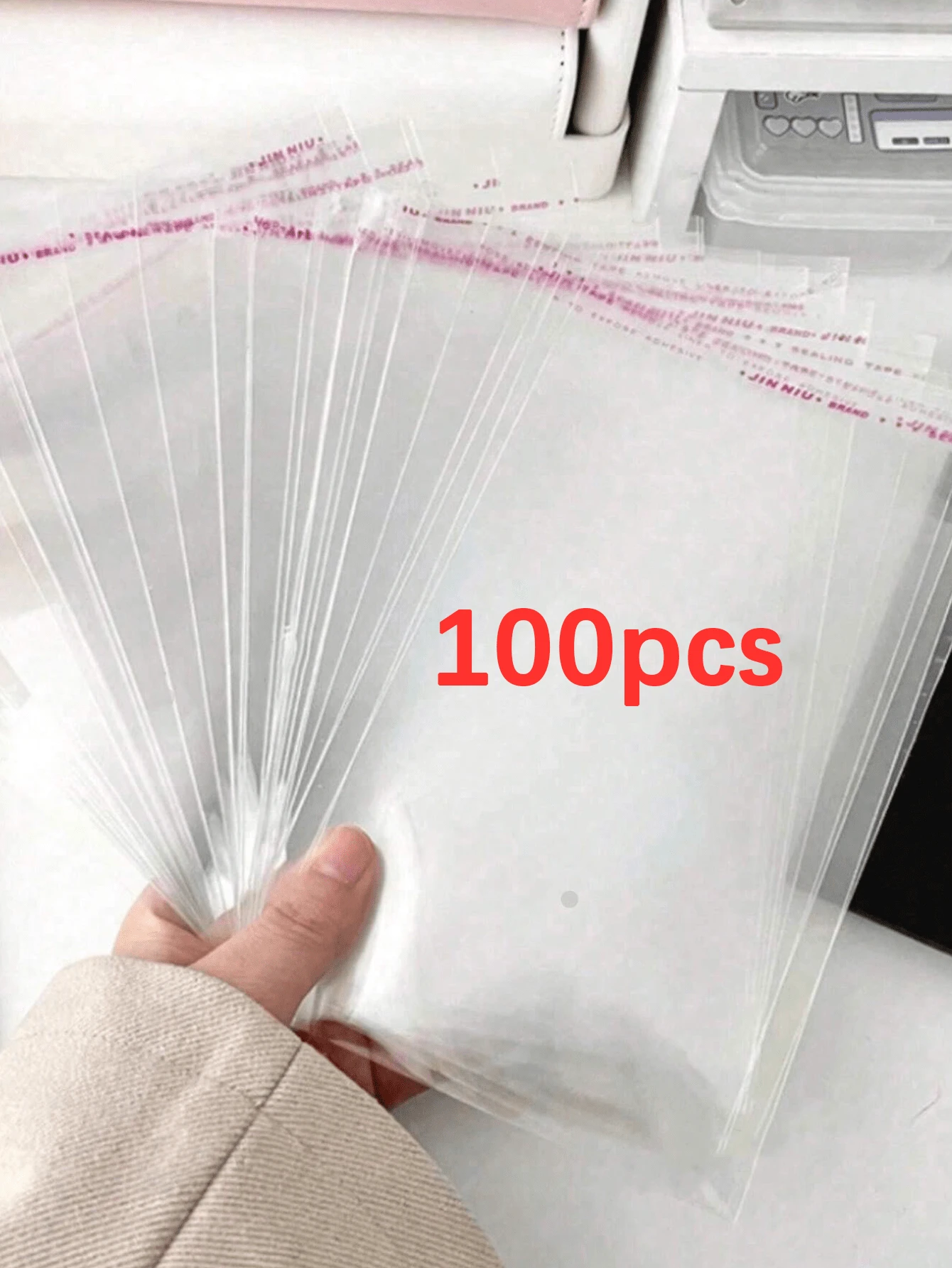 100个透明自粘OPP袋，加厚高透明塑料包装袋，适用于珠宝、小物件、礼品、糖果包装、手工制品、服装配饰、防尘密封、日常杂物收纳 - 無色 - 查看 1
