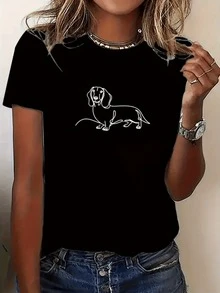 Tracing The Figure Of A Dachshund With Continuous Lines That Represent Loyalty And Everyday Joy, Inspiring Tenderness And Trust, This Modern Casual Women's T-Shirt Is Comfortable And Has An Artistic Flair, Perfect For Everyday Wear. - 黑色 - 查看 8