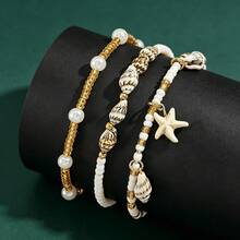 1 Set de pulsera con colgante de estrella de mar y concha hechos a mano, adecuado para vacaciones en la playa - Tobillera blanca 2 - Ver 4