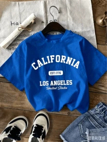 Camia Women's T-Shirt, Round Neck, Short Sleeve, Graphic Print, City Names, CALIFORNIA Los Angeles, United States. Round Neck, Short Sleeve, Spring/Summer, Everyday Wear. Suitable As A Gift. Women's T-Shirt. Blouses > Elegant. Boho Chic. Women's T-Shirt, Soft And Breathable: Perfect For Vacations, Travel, And Festive Occasions, And Suitable For Wearing In Multiple Seasons. - 藍色 - 查看 1