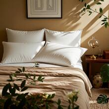 The YUNDO Label White Pillow Core Is Suitable For Sofa Cushions, Mattresses, And Garden Cushions. The Sizes Available Are 18 Inches, 20 Inches, 12*20 Inches, And 22 Inches. It Has A High Filling Content And Can Be Machine Washed And Dried. - White - View 18
