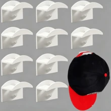 Juego de 10 soportes autoadhesivos para gorras, colgadores de pared multifuncionales, no requieren perforación, caja portagorras, fijación segura para gorras de béisbol, bolsos y accesorios (blanco) - Ver 9