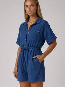 Women's Short Sleeve Romper With A Collared Neckline, Button-Front Closure, Chest Pocket, And Adjustable Drawstring Waist. Designed In A Lightweight Woven Fabric For A Comfortable And Versatile Everyday Look. - Navy Blue - View 1