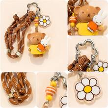 官方授權 Miffy 時尚編織繩鑰匙圈，可愛卡通 Miffy 兔子背包吊飾迷你裝飾飾品。採用精湛編織繩工藝製成，輕巧便攜，是日常鑰匙配件的理想選擇。 - 咖啡棕 - 查看 2