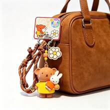 官方授權 Miffy 時尚編織繩鑰匙圈，可愛卡通 Miffy 兔子背包吊飾迷你裝飾飾品。採用精湛編織繩工藝製成，輕巧便攜，是日常鑰匙配件的理想選擇。 - 咖啡棕 - 查看 6