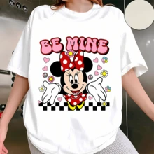 Disney Minnie Mouse "Be Mine" Crew Neck Sweatshirt: This Women's Crew Neck Sweatshirt Features Beloved Disney Character Minnie Mouse In A Sweet Retro-Inspired Design, Perfect For Fans Of The Classic Character. Made With Soft, Thickened Fabric, It Offers A Cloud-Like, Skin-Friendly Feel That Keeps You Warm And Cozy All Day Long. The Front Showcases A Playful Print: Minnie In Her Iconic Red Polka Dot Dress And Bow, Surrounded By Hearts, Flowers, Peace Signs, And The Phrase "BE MINE" In Bubbly Pink Lettering, With A Checkered Border At The Bottom. The Cheerful, Nostalgic Art Style Captures Her Sweet And Playful Spirit Perfectly. Designed With A Relaxed Fit, This Sweatshirt Provides A Comfortable, Flattering Silhouette For All Body Types. It Works Great For Casual Outings, Theme Park Visits, Friend Gatherings, Or Cozy Days In, And Makes A Thoughtful Gift For Any Disney-Loving Fan. - White - View 1
