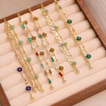 Stainless Steel Fashionable Minimalist Floral Beaded Woven Chain Bracelet, Suitable For Dates, Parties And Office Wear - Yellow Gold - View 6