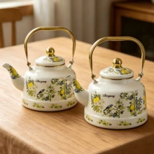 French Retro Pastoral Style + Lemon & Bird Hand-Painted Pattern / Milk White Base With Gilded Trim + Rounded Bulbous Pot Shape + Polished Gold Handle + Golden Lid Details + Uniform Heat Conduction / Easy To Clean & Durable / Large Capacity Water Storage + Enamel Hand-Painted Coffee Water Kettle + Ideal For Daily Home Brewing / Afternoon Tea Hospitality Serving / Kitchen Desktop Decoration / Housewarming Gifting Scenarios - Multicolor - View 3