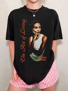 Camiseta unisex con retrato de Olivia Dean en naranja y negro, estilo desgastado, estilo neutro y versátil. - Negro - Ver 7