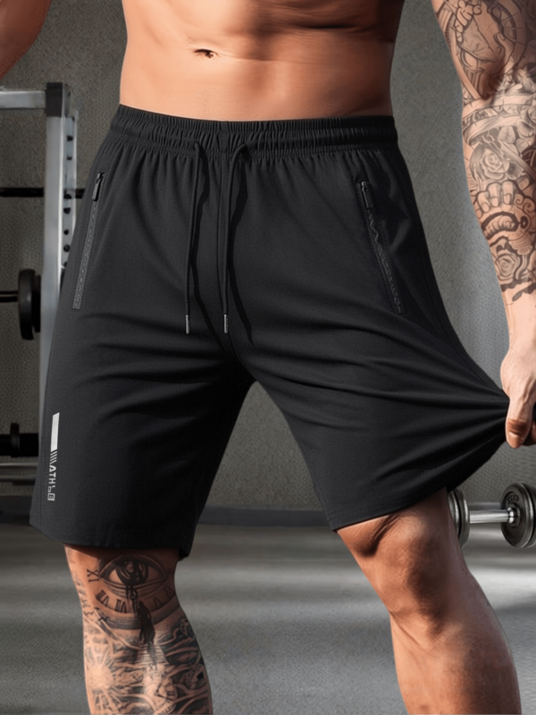 Herrshorts för vardagsbruk, tillverkade av högstretchigt tyg, resår i midjan, dragkedjefickor, reflekterande tryck, lämpliga för utomhuslöpning och vardagsbruk