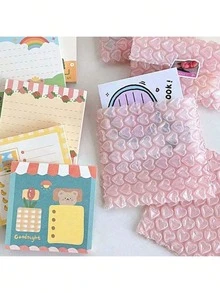 20 paquetes de bolsas de burbujas con forma de corazón, antiestáticas, a prueba de golpes, anti-caídas, se pueden usar como bolsas de envío, bolsas de almacenamiento, bolsas de envoltura de regalo, tarjetas autoadhesivas y sobres de regalo, así como embalaje de papelería, adecuado para Navidad, aniversario, cumpleaños, compromiso, Día de San Valentín y otras ocasiones - Ver 7