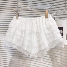 Pantalones cortos de mujer para verano, casuales, de vacaciones, color liso, con encaje, volantes multicapa y cintura con cordón - Blanco - Ver 4
