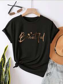 Letras doradas que celebran la belleza femenina con corazones sutiles aportan gran elegancia a esta fresca camiseta de mujer - Negro - Ver 8