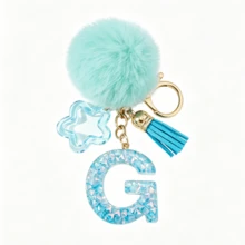 Llavero de letra A-Z con pompones rosa pastel, colgante de bolso y anillo de llaves elegante, accesorio festivo para bolso, regalo imprescindible para el Día de San Valentín/Cumpleaños/Año Nuevo - Turquesa - Ver 21