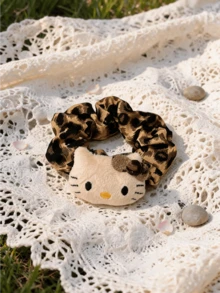 Miniso Hello Kitty 豹紋卡通貓絨毛髮圈 1入 柔軟彈性輕盈 女款 日常派對禮物 - style2 - 查看 5