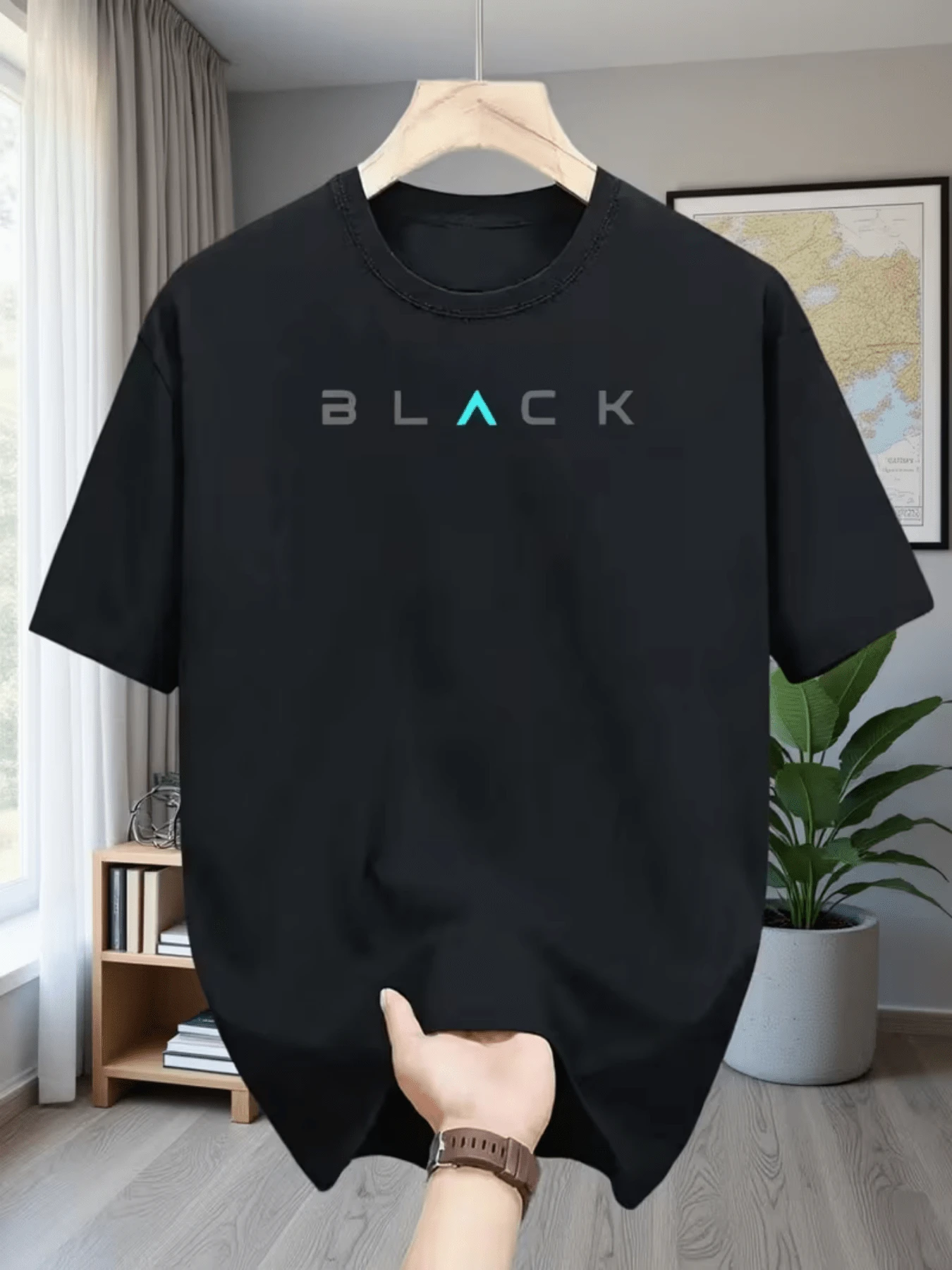 A Word That Highlights Strength And Confidence In Understated Tones With Modern Blue Lettering That Symbolizes Energy And Elegance. A Comfortable, Modern, Casual Men's T-Shirt For Everyday Wear. - Black - View 1