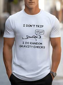 Hombre tumbado en suelo muestra humor al caer probando la gravedad con gracia cómica en esta camiseta de hombre casual con mensaje divertido - Blanco - Ver 1