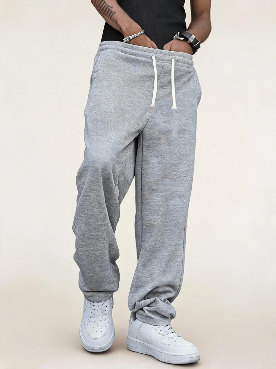 Pantalones de chándal casuales sueltos de unicolor con cordón en la cintura para hombres