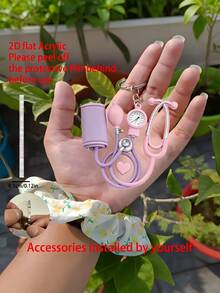 2D 壓克力鑰匙圈，粉色聽診器 + 血壓計套組，1件，醫療風格療癒吊飾，適合護理師、醫生和醫療愛好者的理想禮物，輕巧柔軟 - 彩色 - 查看 9