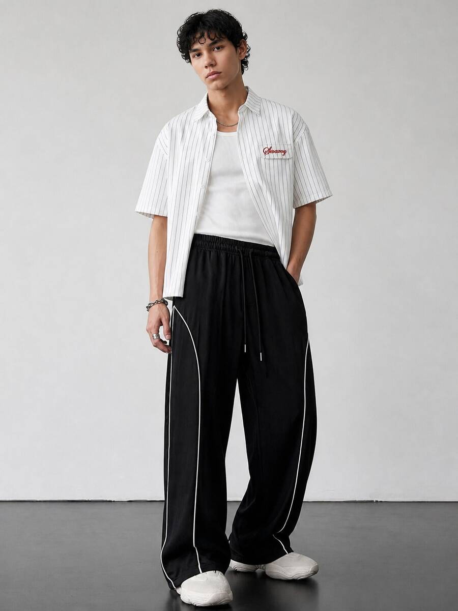 Pantalones casuales para hombres con cordón en la cintura, ribete de contraste y bolsillos, adecuados para el uso diario y el streetwear, primavera/verano - Negro - Ver 1