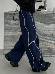 男款混紡寬鬆版型九分長休閒長褲，彈性腰圍，側邊波浪條紋裝飾，街頭風日常穿搭 - 藍色 - 查看 4