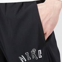 Celana olahraga kasual nyaman berbahan tenun dengan logo Nike polos dan bordir untuk pria. - Hitam - View 6