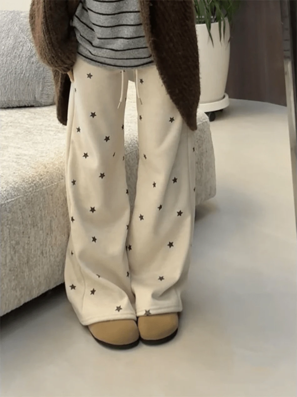 Women Pants - Apricot-colored Star-print Trousers - View 1