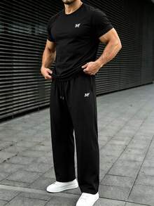2pcs/Set Men's Letter Print Knit Crew Neck Short Sleeve T-Shirt And Loose Straight Leg Casual Pants, Suitable For Spring/Summer, Comfortable Style - Black - View 1