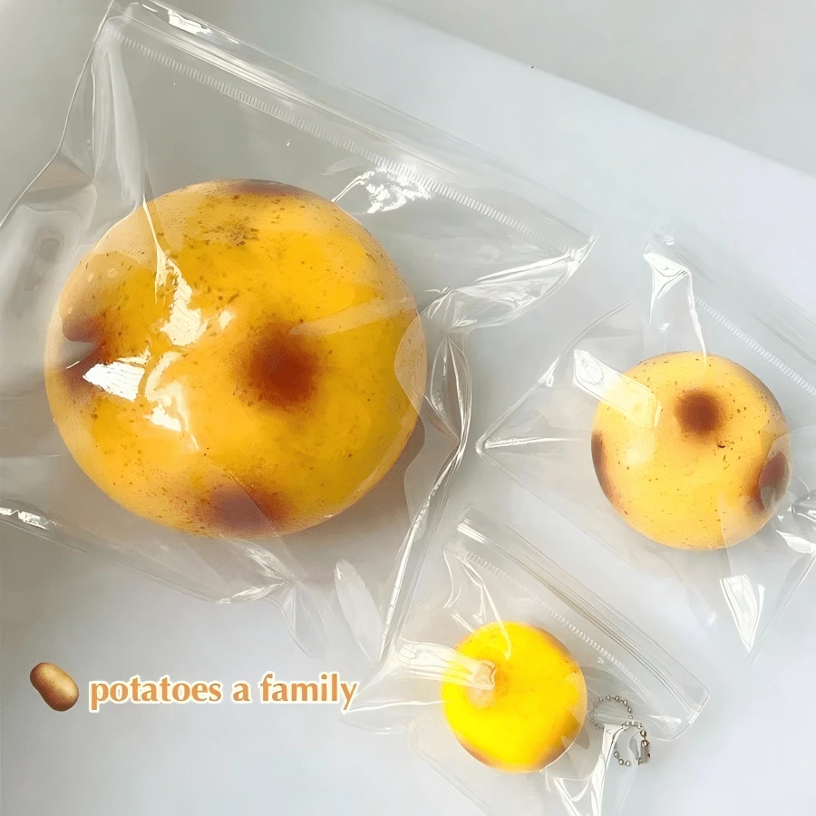 Squishy en forme de pomme de terre rempli de farine, balle anti-stress réaliste en forme de pomme de terre de plusieurs tailles, jouet de décompression pour le bout des doigts à la texture de pâte souple, avec un son de craquement ASMR croustillant, jouet de décompression de bureau, cadeau créatif, accessoire de photographie, jouet de collection original, squishy, jouet à presser, anti-stress - Multicolore - Voir 1