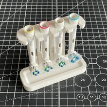 1pc Electric Toothbrush Head Holder, Multi-Slot Toothbrush Head Storage Rack, With Adhesive Back, Replacement Brush Head Organizer, Electric Toothbrush Head Storage Rack, Suitable For Home Use, Durable Plastic, Bathroom Countertop Storage - Multicolor - View 2