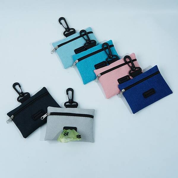 Dispensador de bolsas para desechos de mascotas elegante y práctico, con gancho para fácil sujeción, adecuado para gatos y perros para llevar al aire libre (la cuerda es solo de referencia, el producto no incluye cuerda)