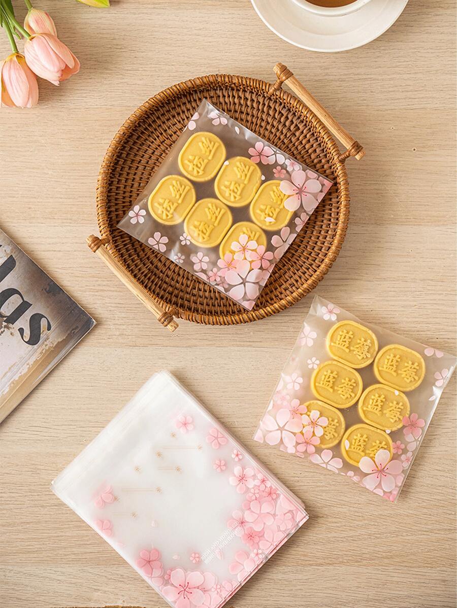 100pcs Sakura Print Self-Adhesive Cookie Packaging Bags, Transparent Frosted Plastic Snack Sealing Bags, Waterproof Candy Cookie Packaging Bags, Suitable For Bakery Shop Party Gifts - Multicolor - View 1