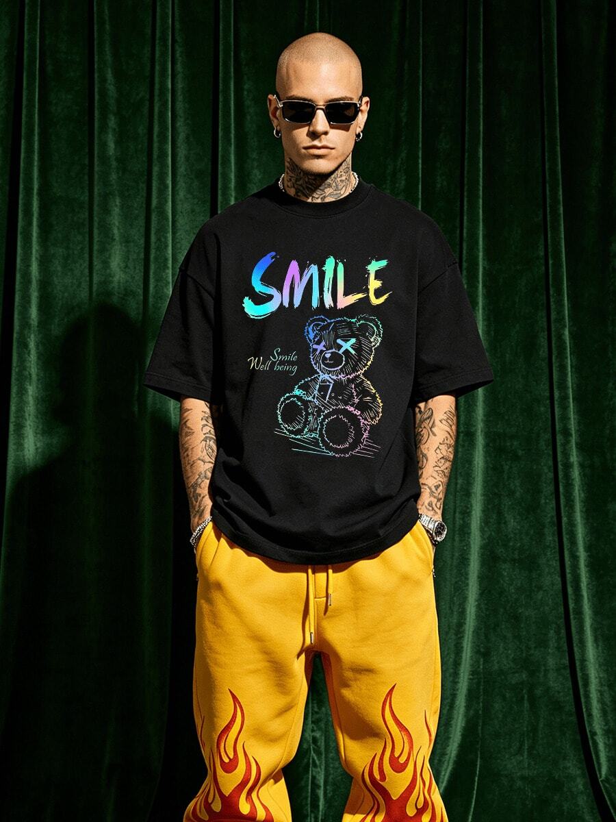Camisa de manga corta de cuello redondo suave y casual de verano para hombre, con estampado gráfico de oso sonriente holográfico para uso diario. - Negro - Ver 1