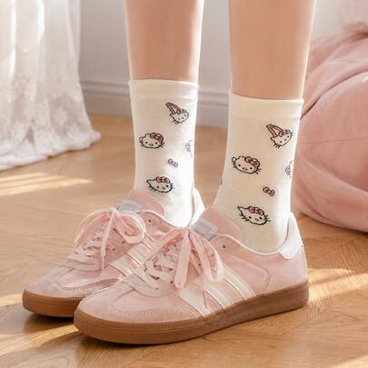 MINISO Sanrio Hello Kitty 全身印花中筒襪，可愛蝴蝶結與臉部圖案，棉混紡，返校必備