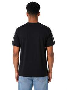 Skechers Serie de colores lisos | Camiseta de manga corta con cuello redondo, cómoda, resistente a las arrugas y versátil, ideal para los desplazamientos diarios del hombre. - Negro - Ver 3