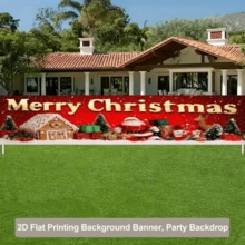 2D 平面聖誕主題橫幅背景布,紅色背景配金色「Merry Christmas」文字,含薑餅屋、聖誕樹、禮物盒與馴鹿,無需電源 - 查看 3