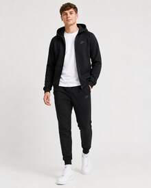 Pantalones deportivos de punto Nike de cintura media con cordones y puños, para hombre, color negro - Negro - Ver 5