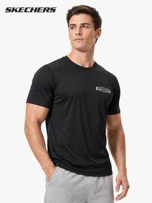 Skechers Kaos Pria Lengan Pendek Kerah Bulat Longgar, Atasan Olahraga Serbaguna untuk Lari dan Perjalanan - Hitam - View 1