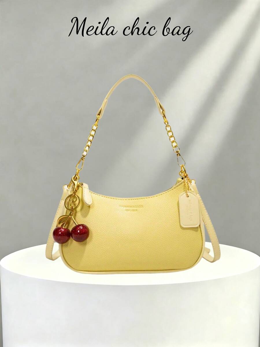 La nueva bolsa de hombro en forma de media luna de moda clásica con diseño de decoración de patrón de letra salvaje, de unicolor, de tela impermeable de PU, es adecuada para ir de compras y se puede colgar. - Amarillo - Ver 1