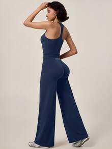 TimeOff Conjunto deportivo de mujer de un solo color con camiseta de tirantes de espalda atlética con almohadillas desmontables y pantalones de cintura alta de pierna ancha - Azul - Ver 3