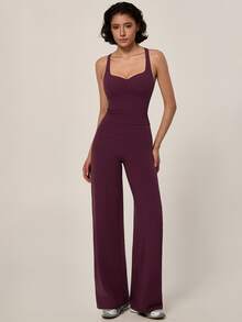 TimeOff Conjunto deportivo de mujer de un solo color con camisola de espalda nadadora con relleno extraíble y pantalones de cintura alta y pierna ancha - Morado - Ver 10