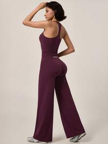 TimeOff Conjunto deportivo de mujer de un solo color con camisola de espalda nadadora con relleno extraíble y pantalones de cintura alta y pierna ancha - Morado - Ver 3