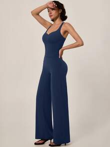 TimeOff Conjunto deportivo de mujer de un solo color con camiseta de tirantes de espalda atlética con almohadillas desmontables y pantalones de cintura alta de pierna ancha - Azul - Ver 10