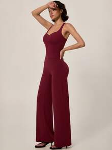 TimeOff Conjunto deportivo de mujer de un solo color con camiseta de tirantes de espalda nadadora con relleno extraíble y pantalones de cintura alta de pierna ancha - Rojo - Ver 10